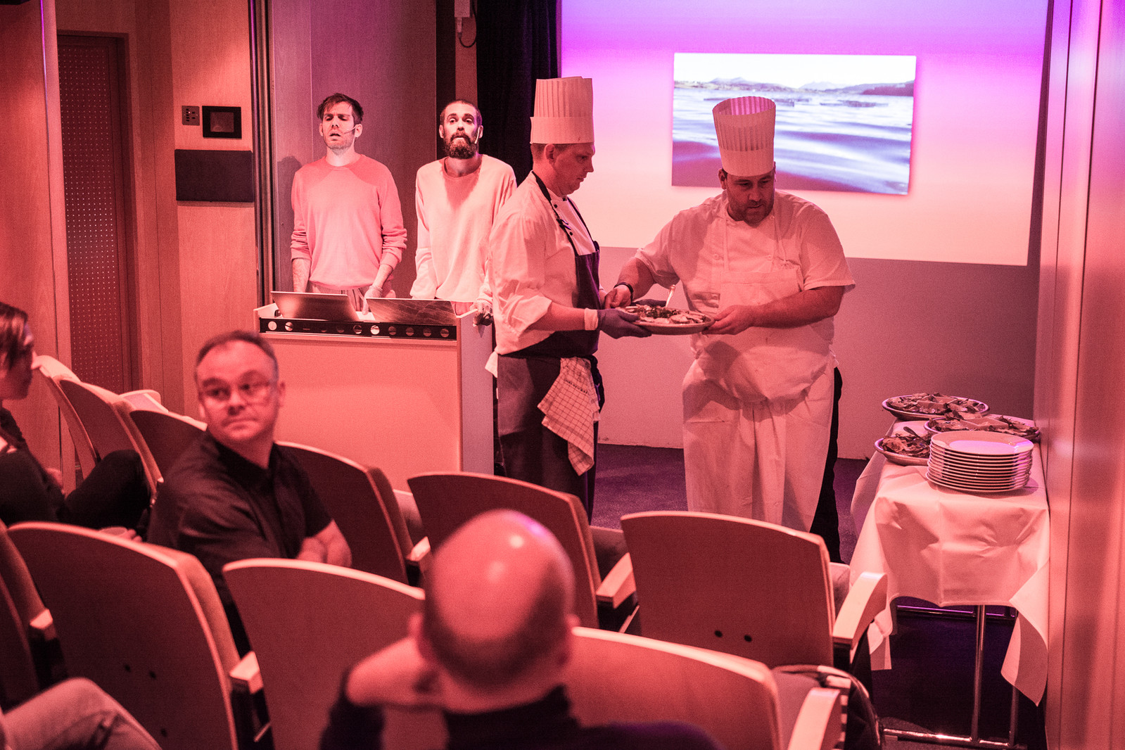 CLIMAVORE: On Tidal Zones. Lecture-performance by Cooking Sections (Daniel Fernández Pascual and Alon Schwabe) during the second edition "Rugged, Weathered above the sea", curated by Charles Aubin in 2018. Photo: Laimonas Puisys