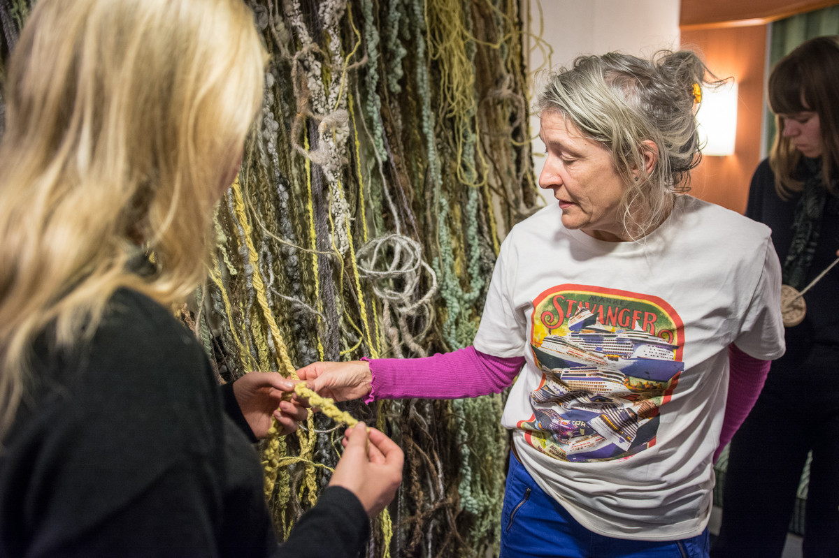 Anne Karin Jorveit in front of her textile work; Index for a place of no importance