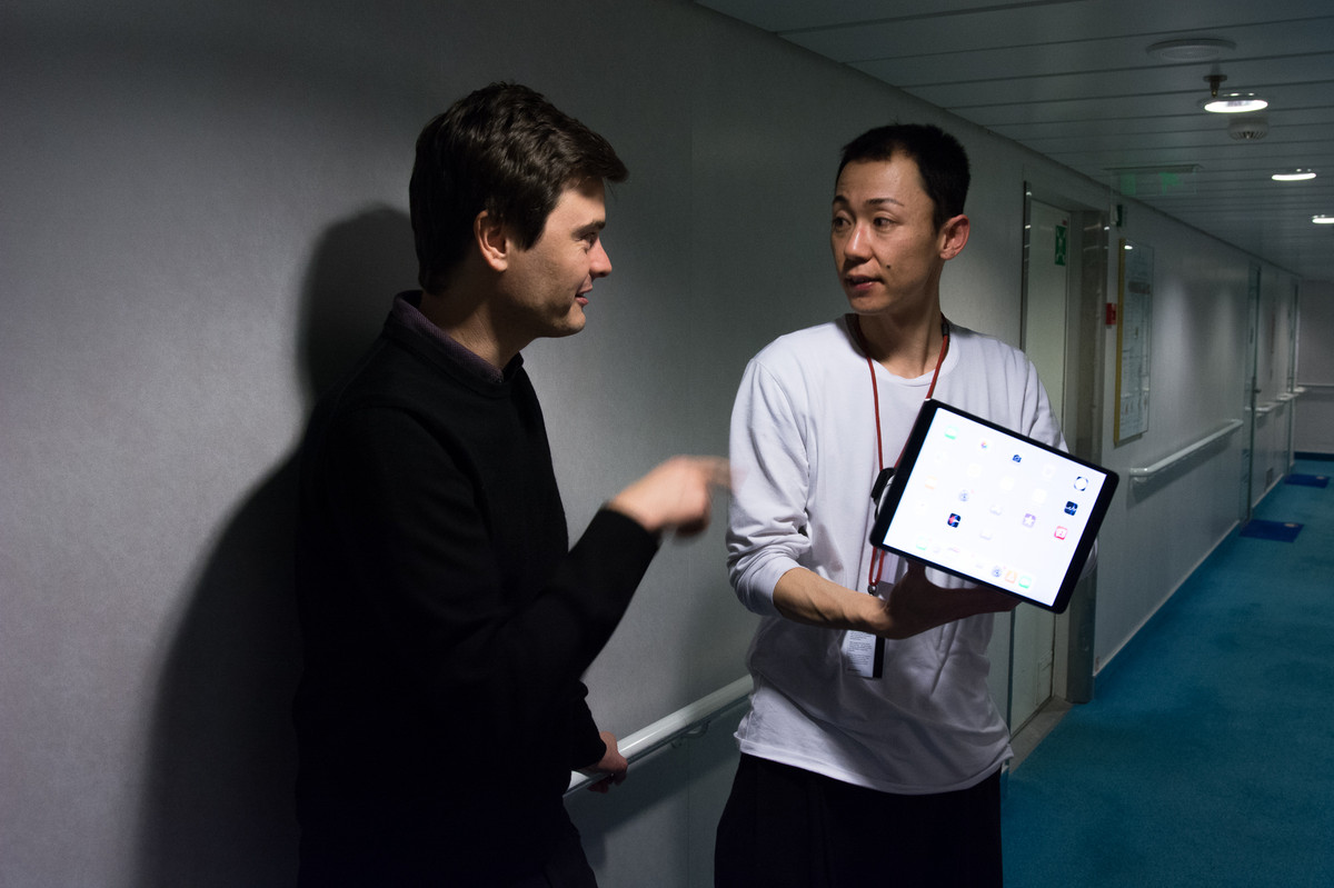 Curator of the second edition Charles Aubin and artist Daisuke Kosugi on board Hurtigruten. Photo: Laimonas Puisus