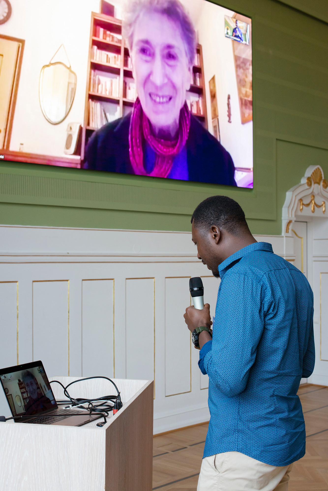 Sivia Federici during Q & A, speaking with Larry Ibrahim Mohammed. 