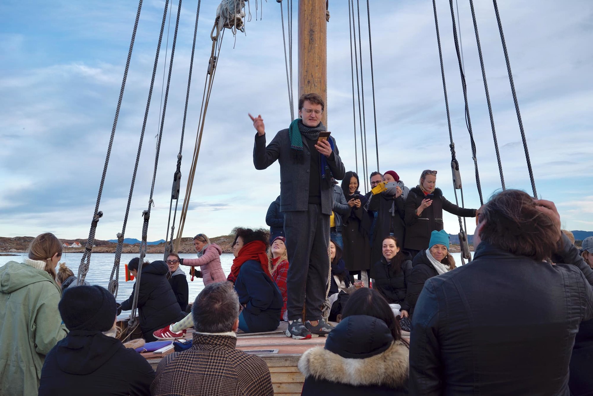 Valentinas Klimasauskas starting off the participatory performance "Everybody Reads Fishing on Håholmen Havstuers ship. Photo: Kobie Nel.