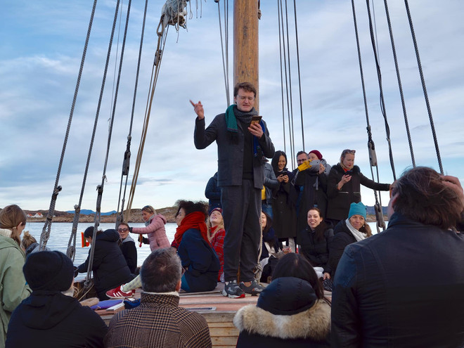 Valentinas Klimasauskas starting off the participatory performance "Everybody Reads Fishing on Håholmen Havstuers ship. Photo: Kobie Nel.