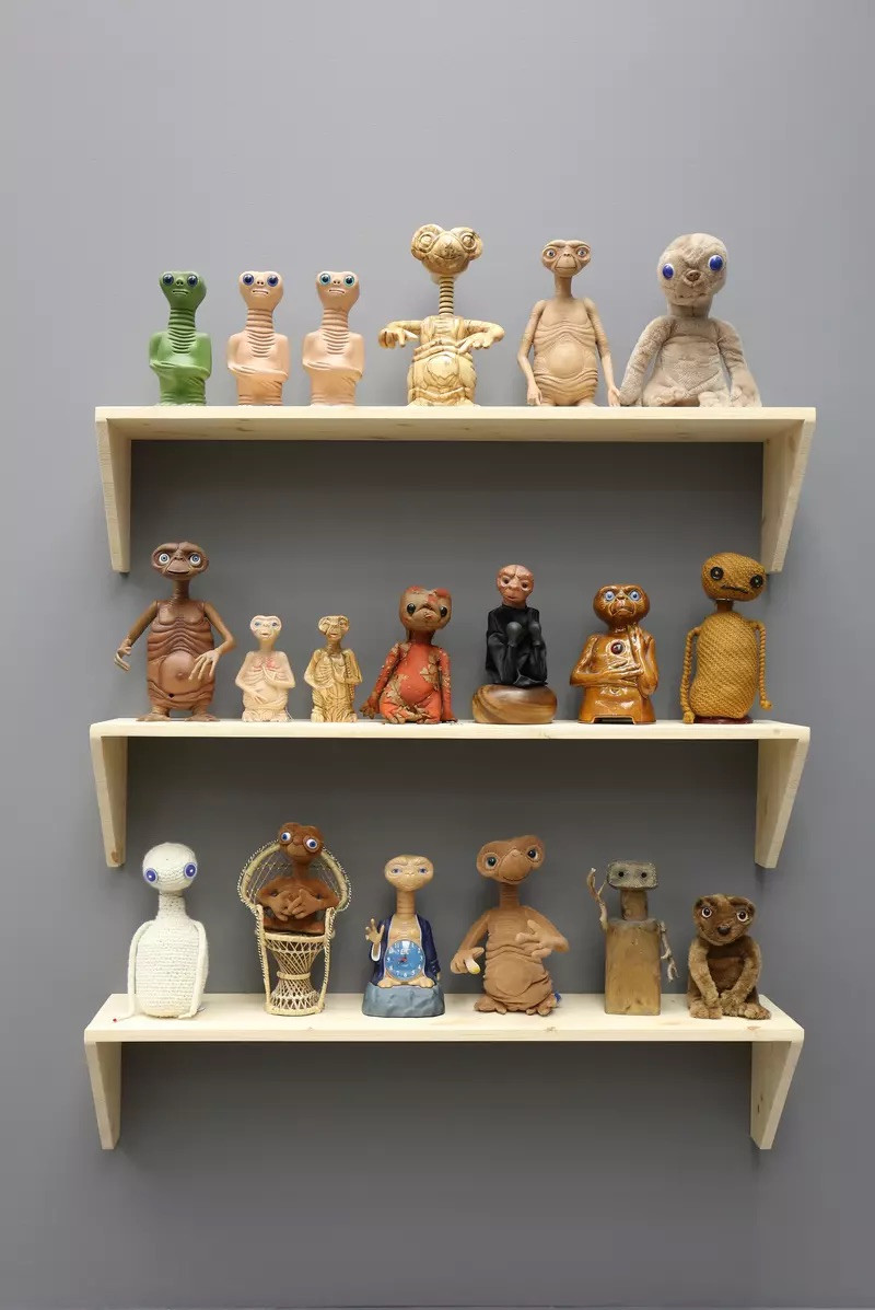 E. T. shelf, 2017. E.T dolls and wood.