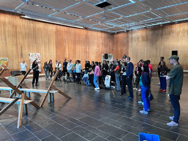 My Fathers Left: mixtape, by Artist Amber Ablett. A collective listening session in and around a wooden installation at the old Munch Museum during Art on Food, 2024. Servings of home brewn ginger beer by the artist was handed out to the audience before listening.