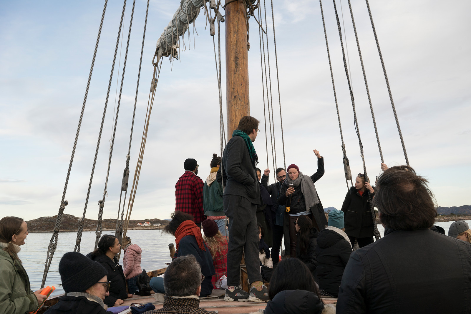 "EVERYBODY READS FISHING" a participatory performance on a boat in Hustadvika/Håholmen, by curator Valentinas Klimasauskas (Lithuania) during Coasts third edition "Organized Freedom" curated by Sverre Gullesen and Tanja Sæter, 2019