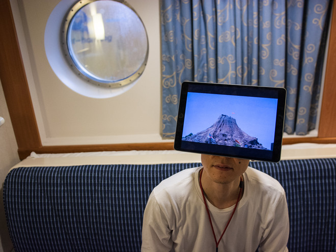 Daisuke Kosugi performing in a cabin on Hurtigruten. Photo: Laimonas Puisys.